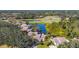 Stunning aerial view of homes overlooking the golf course and lake at 3008 Highlands Bridge Rd, Sarasota, FL 34235