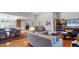 Open-concept living space with comfortable seating and seamless transition to the kitchen and dining area at 3008 Highlands Bridge Rd, Sarasota, FL 34235