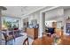 Spacious living room featuring hardwood floors, an open layout, and lots of natural light at 3008 Highlands Bridge Rd, Sarasota, FL 34235