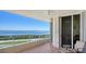 Inviting balcony with seating, offering beautiful views of the ocean and cityscape at 3040 Grand Bay Blvd # 234, Longboat Key, FL 34228