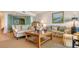 Comfortable living room featuring sofas, and stylish decor at 3040 Grand Bay Blvd # 234, Longboat Key, FL 34228