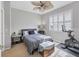 Cozy bedroom featuring a ceiling fan, natural light, and a peaceful ambiance at 3826 Virga Blvd, Sarasota, FL 34233