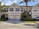 Charming townhome with a two-car garage, well-manicured landscaping, and a sunny, inviting appearance at 3826 Virga Blvd, Sarasota, FL 34233