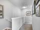 Well-lit upper hallway with neutral paint and carpet at 3826 Virga Blvd, Sarasota, FL 34233