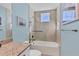 Bathroom featuring a bathtub with shower and vanity with granite countertop at 396 Aruba Cir # 302, Bradenton, FL 34209