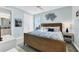 Bedroom featuring a bed with colorful covers, ceiling fan and closet at 396 Aruba Cir # 302, Bradenton, FL 34209