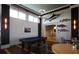 Game room with a pool table, fish decor, wood floors, and table seating at 396 Aruba Cir # 302, Bradenton, FL 34209