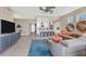 Open living space with modern furniture, natural light and an adjoining eat-in kitchen at 396 Aruba Cir # 302, Bradenton, FL 34209
