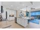 Bright living space connects the kitchen and living room with great views and stylish furnishings at 396 Aruba Cir # 302, Bradenton, FL 34209