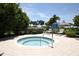 A hot tub and seating in a landscaped area at 396 Aruba Cir # 302, Bradenton, FL 34209