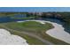 Beautiful aerial view of the golf course and waterfront homes, offering a luxurious lifestyle at 4416 Calle Serena, Sarasota, FL 34238