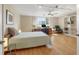 A bright, airy bedroom with a ceiling fan, lots of natural light and space for a home office at 4416 Calle Serena, Sarasota, FL 34238