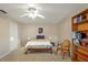 Cozy bedroom with carpet and bookshelf at 4416 Calle Serena, Sarasota, FL 34238