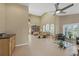 Expansive living area featuring tile floors, high ceilings, wet bar, and abundant seating at 4416 Calle Serena, Sarasota, FL 34238