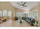 Spacious living room filled with natural light, modern furniture, and a vaulted ceiling at 4416 Calle Serena, Sarasota, FL 34238