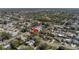 Expansive aerial view of a residential neighborhood with tree-lined streets and well-maintained homes, showcasing community charm at 4461 Maceachen Blvd, Sarasota, FL 34233
