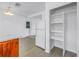Bright kitchen featuring an open pantry and white appliances adjacent to the entry at 4461 Maceachen Blvd, Sarasota, FL 34233