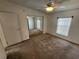 This bedroom offers a large closet, neutral tones, and a window providing natural light at 4923 5Th Street W Ct, Bradenton, FL 34207