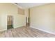 The bright bedroom features a light wood floor, enhancing the space's welcoming feel at 5308 88Th E St, Bradenton, FL 34211