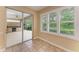 Cozy breakfast nook featuring natural light, tile floors, and access to the outdoor space at 5308 88Th E St, Bradenton, FL 34211