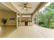 Inviting covered patio with outdoor kitchen area and view of screened lanai at 5308 88Th E St, Bradenton, FL 34211