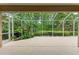 Large screened patio area surrounded by lush landscaping offering privacy and space at 5308 88Th E St, Bradenton, FL 34211