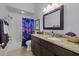 Bathroom features a granite countertop, white tile, and a shower-tub combination at 5510 Palm Aire Dr, Sarasota, FL 34243