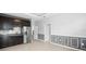 Kitchenette with stainless steel appliances, dark cabinets, and decorative wall molding at 559 Spotted Slipper Pl, Ruskin, FL 33570