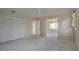Bright bedroom with closet doors, bathroom access, neutral walls, and natural light, creating a comfortable and inviting space at 5621 Palm Aire Dr, Sarasota, FL 34243