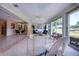 Open living space with golf course views, seamlessly connecting indoor comfort with outdoor scenery at 5621 Palm Aire Dr, Sarasota, FL 34243