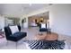 Spacious room with seating and zebra rug, creating a unique and inviting space at 5621 Palm Aire Dr, Sarasota, FL 34243