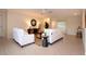 Bright living room boasts neutral walls, tile flooring, and stylish furnishings, perfect for relaxing and entertaining guests at 5621 Palm Aire Dr, Sarasota, FL 34243