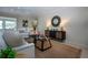 Warm living room showcasing tiled floors, stylish furniture, and an open layout for easy entertaining at 5621 Palm Aire Dr, Sarasota, FL 34243