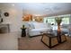 Comfortable living room showcasing stylish decor, tiled flooring, and an open layout for easy entertaining at 5621 Palm Aire Dr, Sarasota, FL 34243