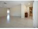 Bright living room featuring neutral walls and tiled floor at 5621 Palm Aire Dr, Sarasota, FL 34243