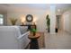 Inviting living room featuring tiled flooring, stylish furnishings, and a comfortable seating arrangement at 5621 Palm Aire Dr, Sarasota, FL 34243