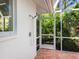 Enclosed outdoor shower, provides a refreshing rinse after a swim in the pool at 5646 Country Lakes Dr, Sarasota, FL 34243