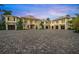 Grand estate with a large circular driveway and multiple garages at 612 Juan Anasco Dr, Longboat Key, FL 34228