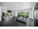 Home gym featuring state-of-the-art equipment, mirrors, and a waterfront view at 612 Juan Anasco Dr, Longboat Key, FL 34228