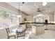 Bright kitchen featuring granite countertops, and stainless steel appliances at 6512 Moorings Point Cir # 201, Lakewood Ranch, FL 34202