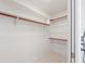 Walk-in closet with built-in shelving and ample storage space at 6732 Keystone Dr, Sarasota, FL 34231