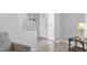 Bright foyer featuring neutral tile flooring, fresh paint, and a view into other rooms at 6732 Keystone Dr, Sarasota, FL 34231