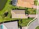 Aerial view showcasing the home's private backyard, lush landscaping, and well-maintained surroundings at 6912 Gosport Cv, Bradenton, FL 34202