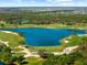 Enjoy beautiful views of the golf course and serene lakes within this active golf community at 6912 Gosport Cv, Bradenton, FL 34202