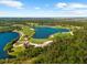 Enjoy beautiful views of the golf course and serene lakes within this active golf community at 6912 Gosport Cv, Bradenton, FL 34202