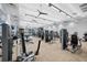 Spacious gym featuring fitness equipment, ceiling fans and large windows at 6912 Gosport Cv, Bradenton, FL 34202