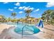 A community pool with a splash area and relaxing hot tub at 6912 Gosport Cv, Bradenton, FL 34202