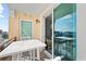 Enjoy outdoor dining on this private balcony with views of the city at 750 N Tamiami Trl # 814, Sarasota, FL 34236
