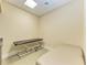 Clean, modern exam room with an adjustable table and comfortable bed at 750 N Tamiami Trl # 814, Sarasota, FL 34236