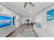 Bright and airy living room featuring stylish decor and a view of the modern kitchen at 750 N Tamiami Trl # 814, Sarasota, FL 34236